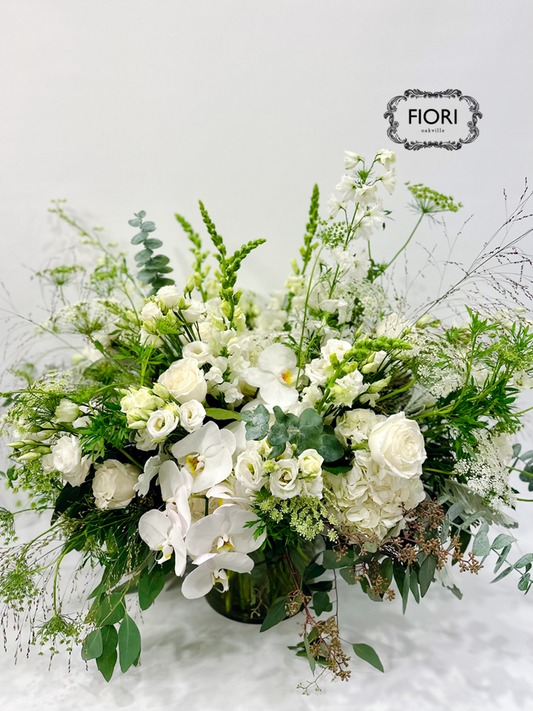 White Sympathy Flowers  for the funeral service FIORI Oakville Florist