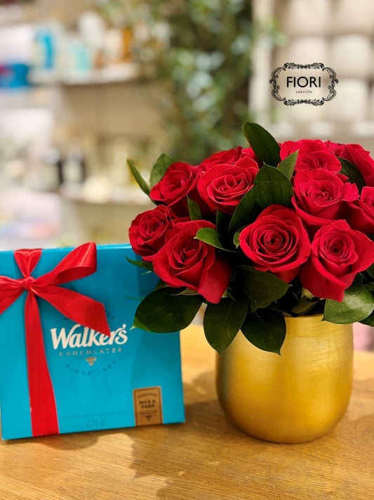 Red roses in gold bowl with Walker's chocolates for Valentine's Day delivery FIORI Oakville Florist Burlington. 