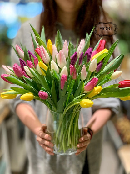 Tulip arrangement. Order and send flowers online for every occasion delivery in Oakville, Burlington, Mississauga, Milton, Etobicoke, Toronto and Hamilton Greater area. Full service flower store voted best florist.