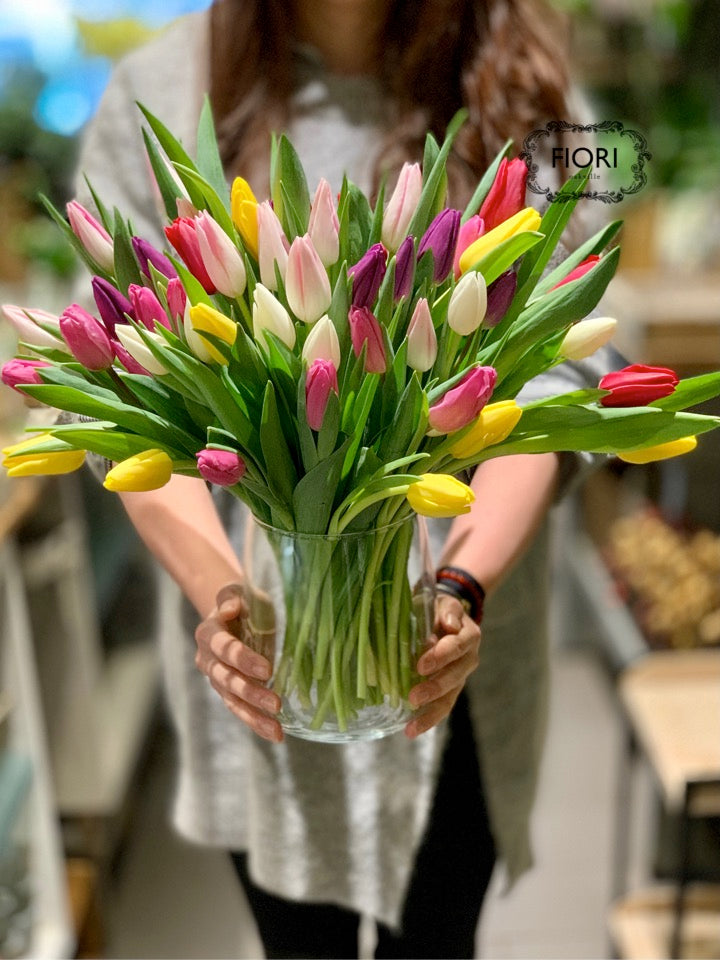 Rainbow Tulip Collective in a Vase